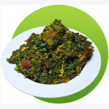 Fresh Afang soup made with okazi leaves, waterleaf and assorted meats served in a bowl.