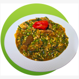 Nigerian okro soup with okra, palm oil and assorted protein freshly made and packed in a hearty bowl.
